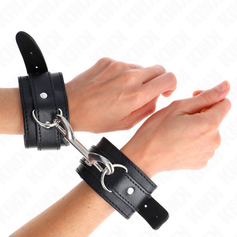 Entrave de poignet ajustable à rangée de rivets noire — KINK WRIST RESTRAINT
