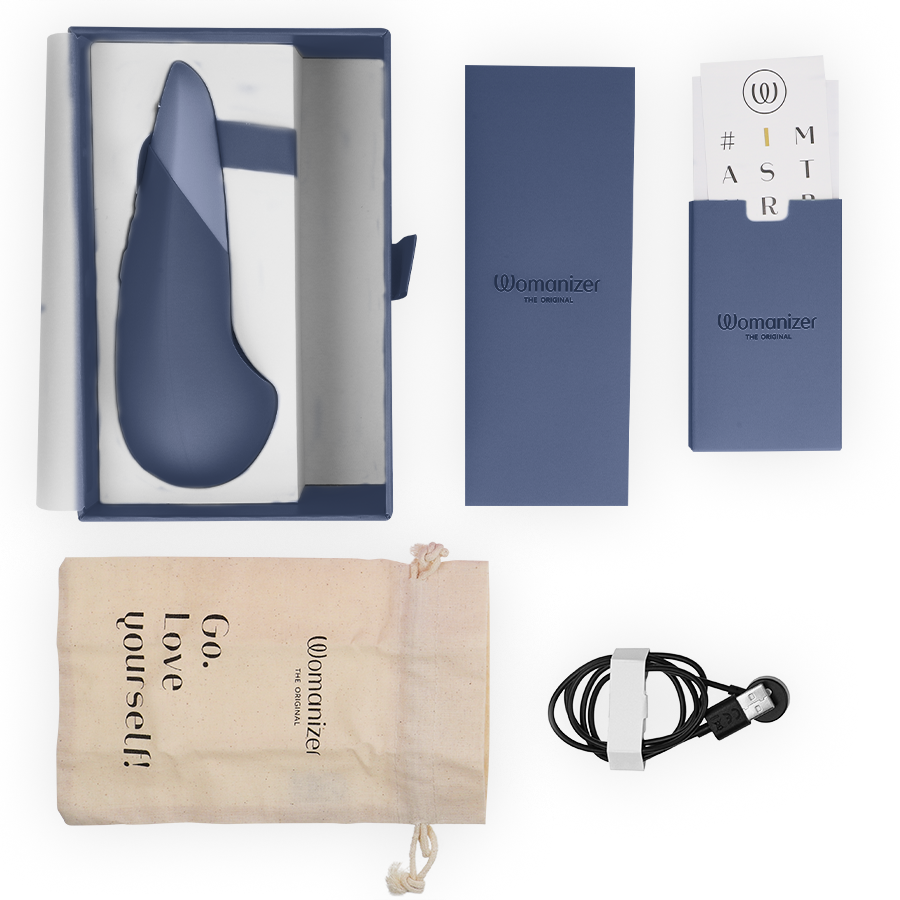Vibromasseur posé silencieux bleu foncé — WOMANIZER